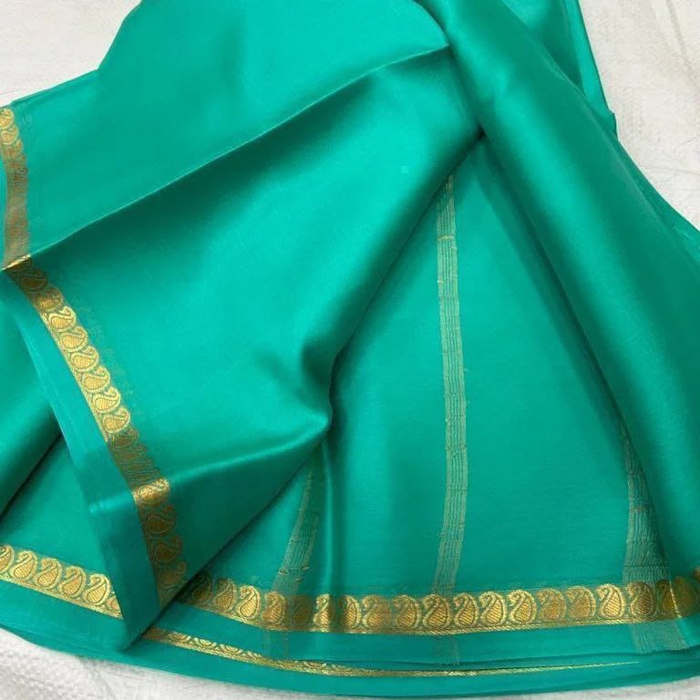 Vibrant Turquoise Green Soft Silk Saree with Gold Zari Motif Border