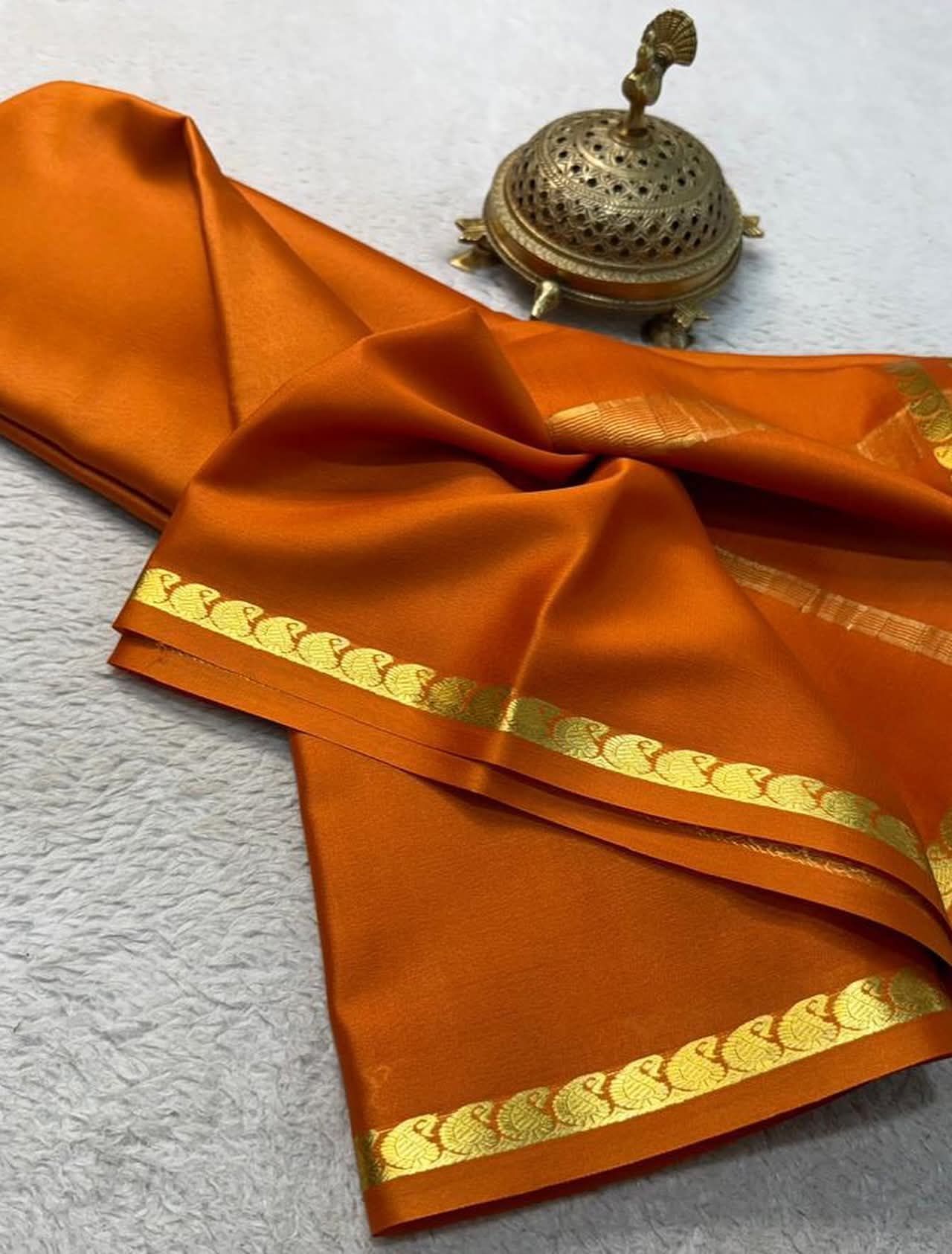 Burnt Orange Soft Silk Saree with Traditional Gold Zari Peacock Border