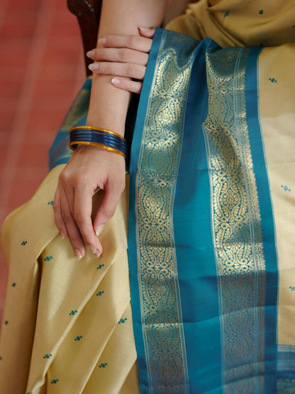 Light Khaki Kanjeevaram Silk Saree with Teal Blue Border