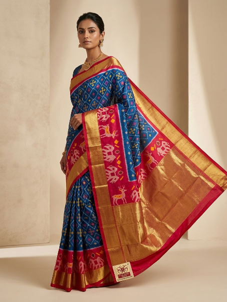 Teal Blue Pochampally Ikkat Silk Saree with Red Border
