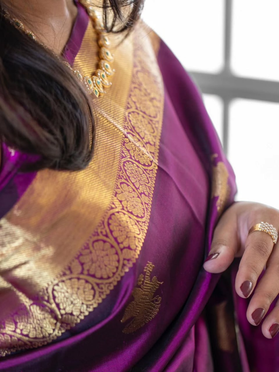 Purple Saree with Golden Peacock Motifs